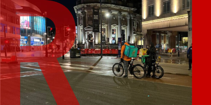Cyclist waiting at traffic lights