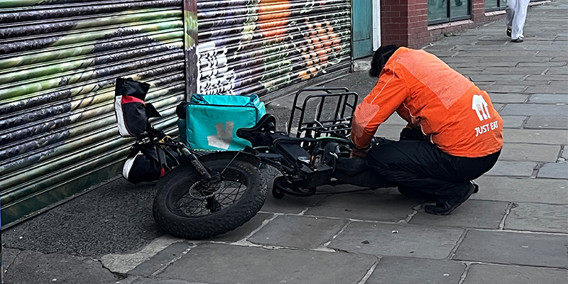 Rider trying to fix bike