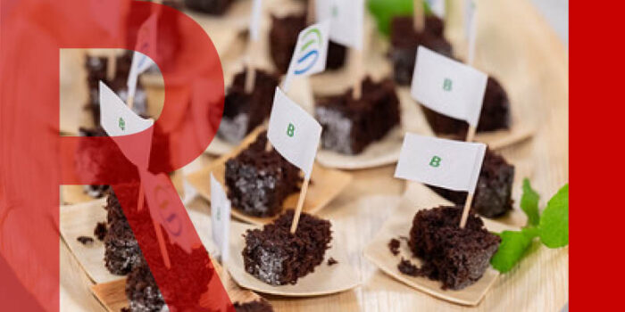 Plant based baked goods on a tray with cocktail sticks in