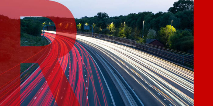 Blur of headlights and tail lights down the motorway