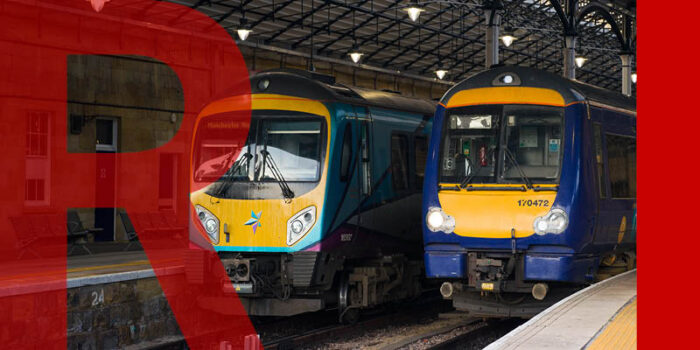 Two stationery trains in a station